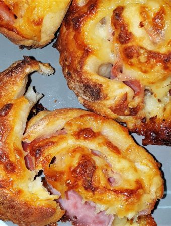 Closeup shot of ham and cheese pinwheels.
