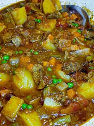 Close up of a plate of leftover lamb curry.