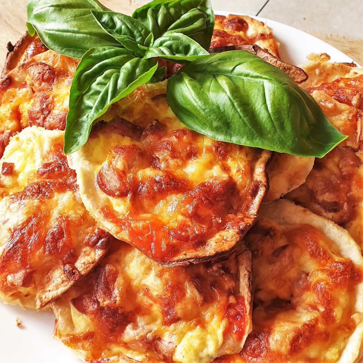 Overhead shot of a plate of eggy cheesy things.