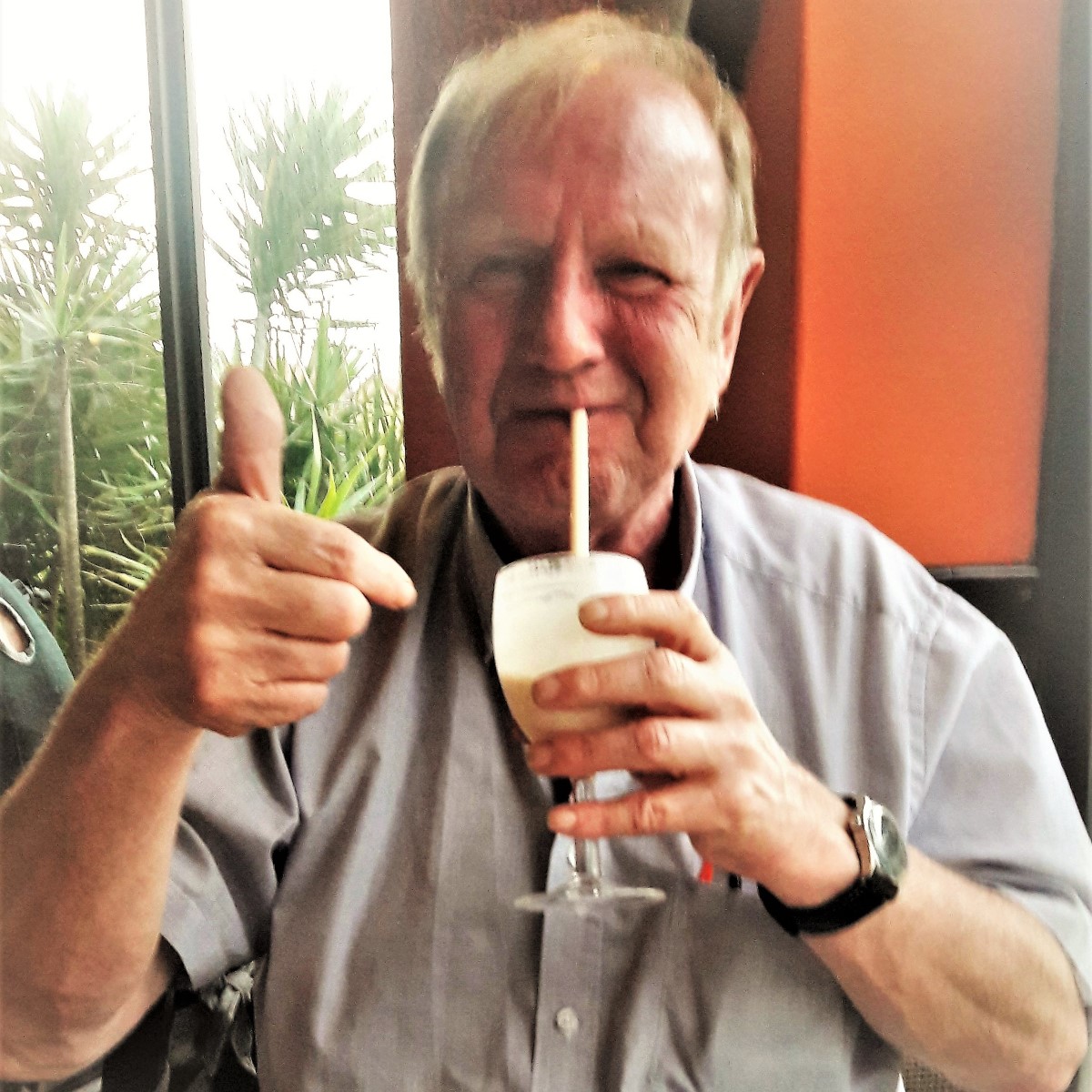 Graham enjoying a glass of dom pedro.