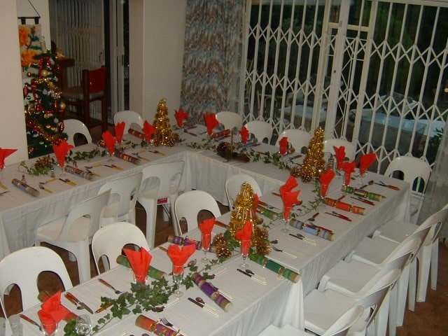 A Christmas table set for 30 people.