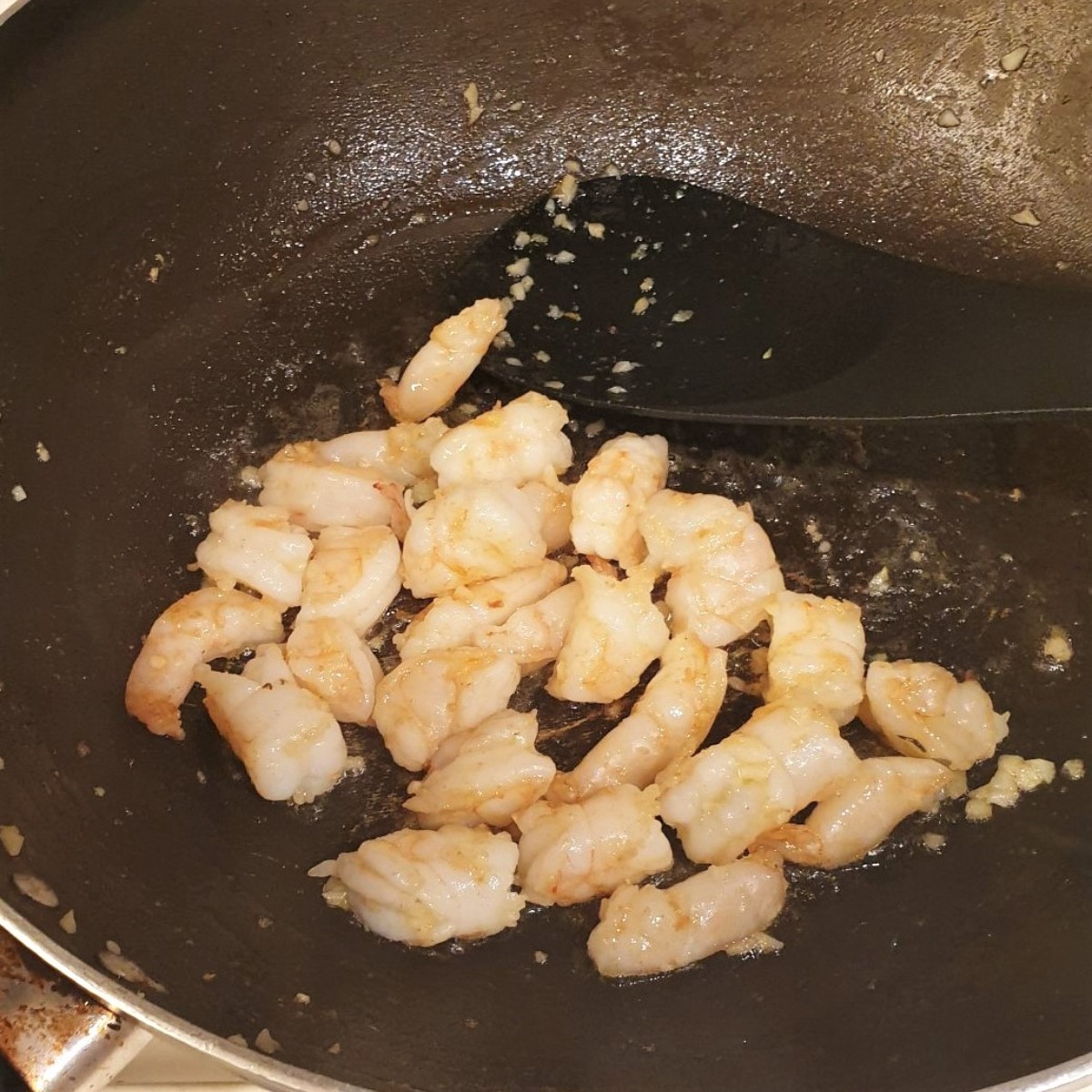 Shrimp frying in a pan.