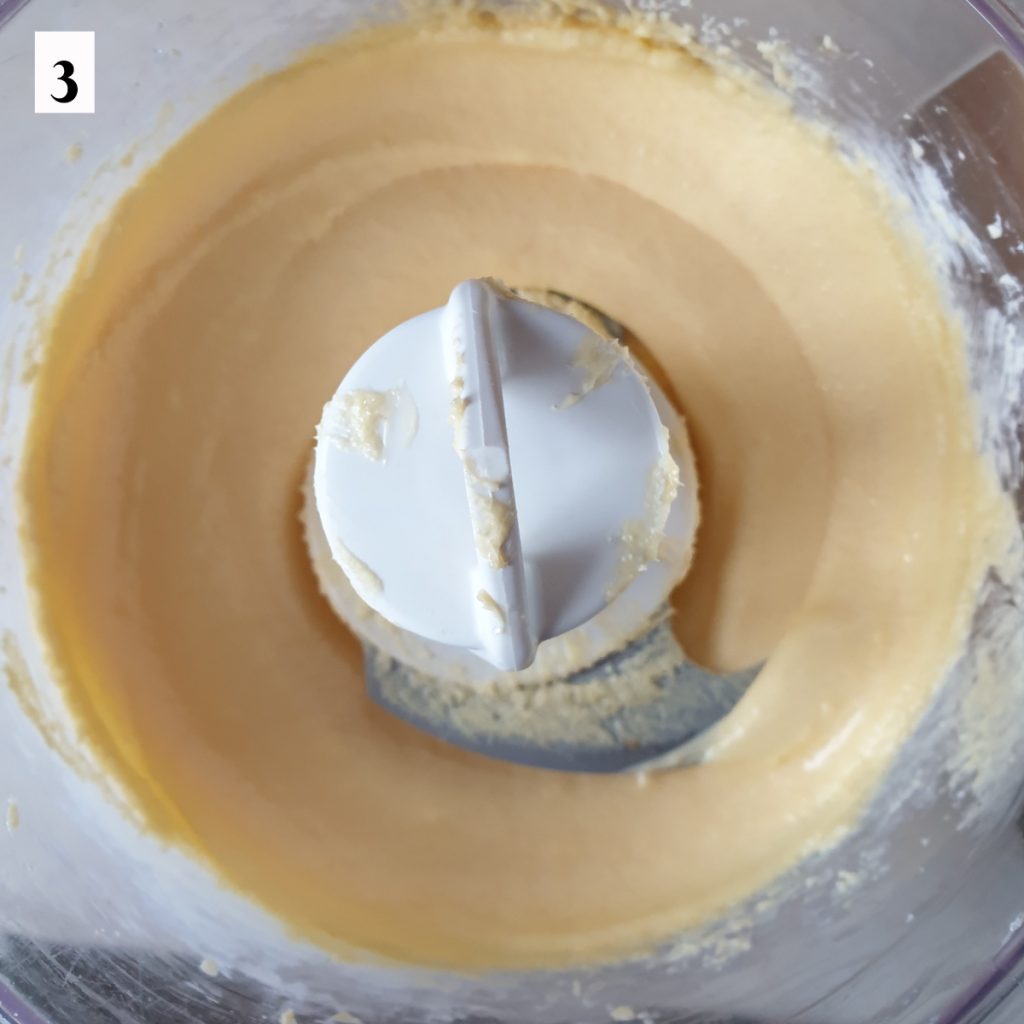 Eggs, sugar and butter whisked together in a food processor.