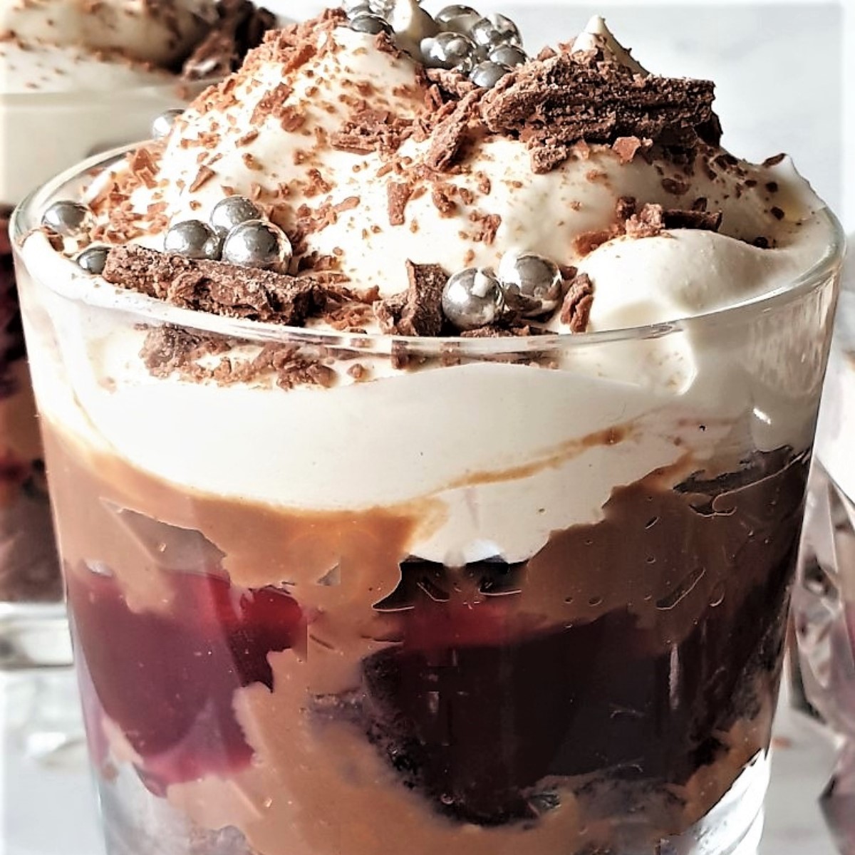 Closeup of a glass of black forest trifle.