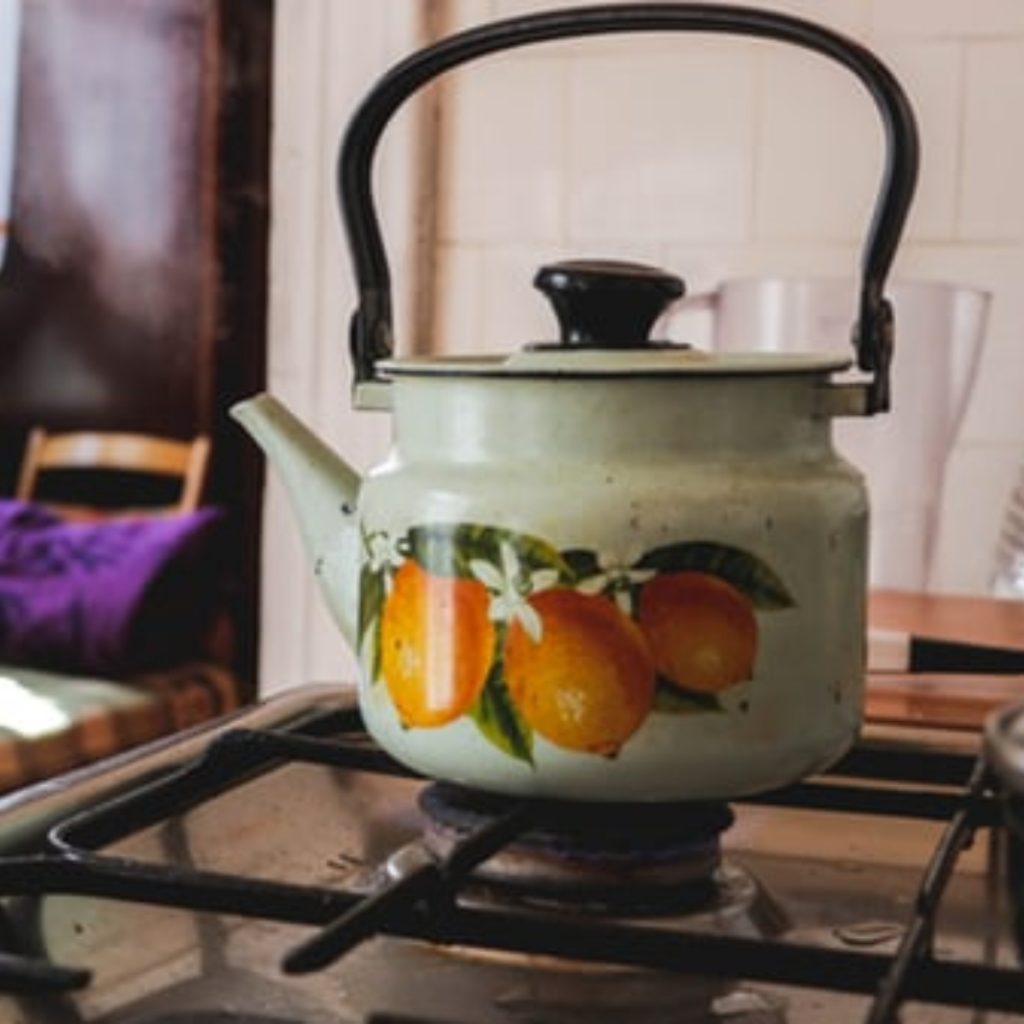 A kettle on the stove.