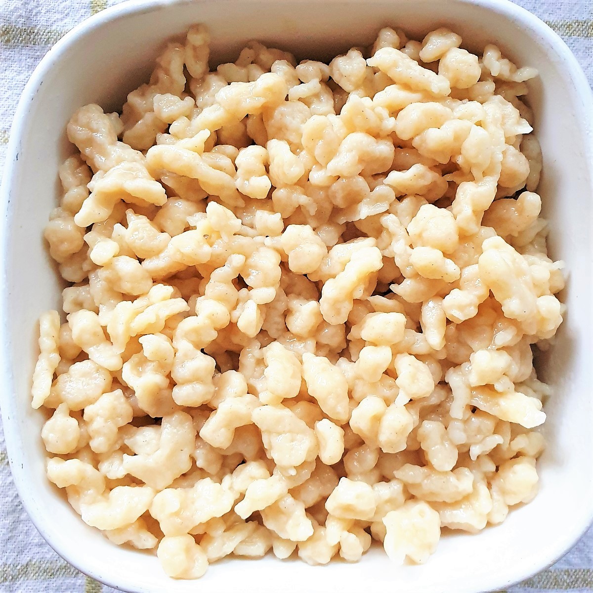 Overhead shot of a dish of homemade spaetzle.