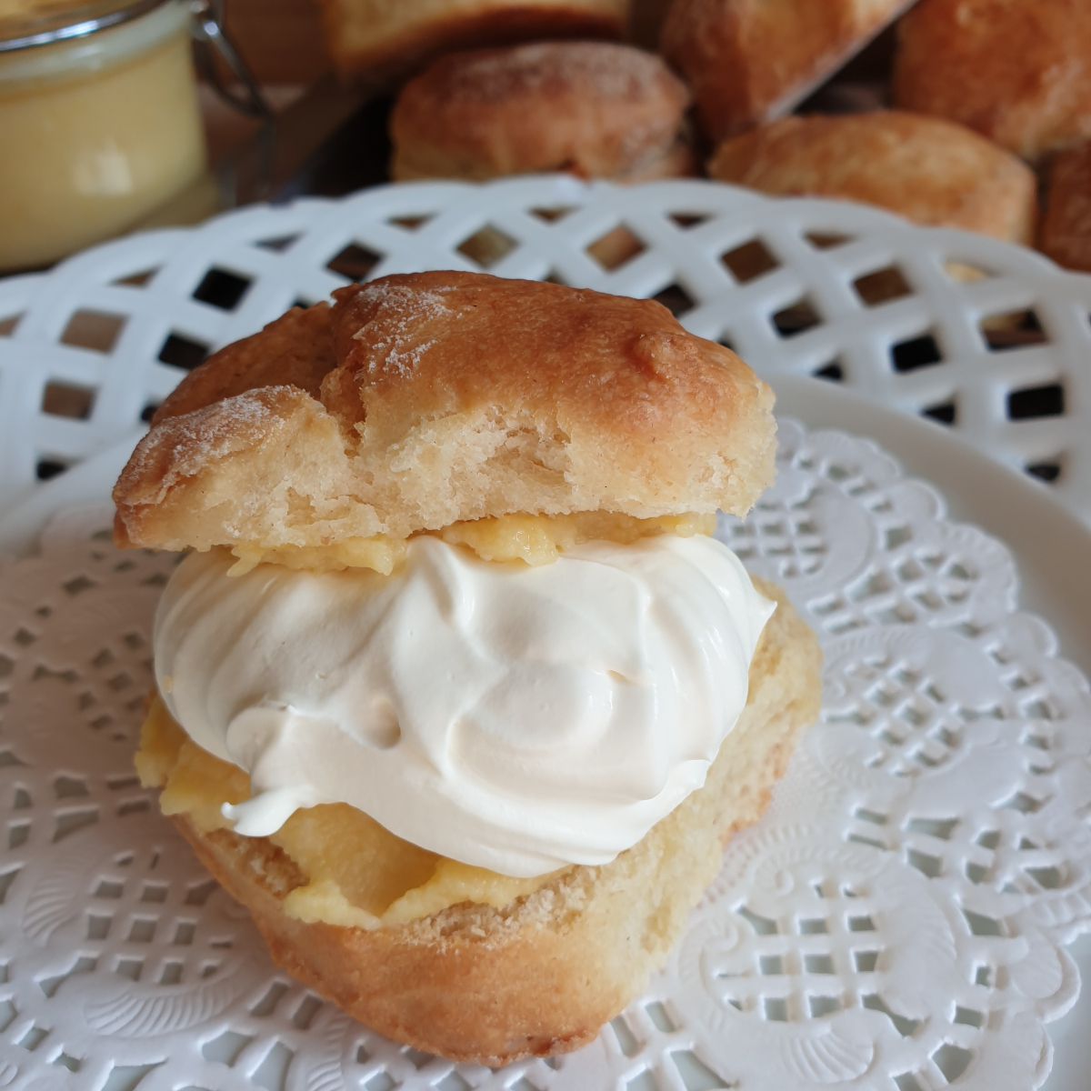 A lemonade scone filled with orange curd and whipped cream.