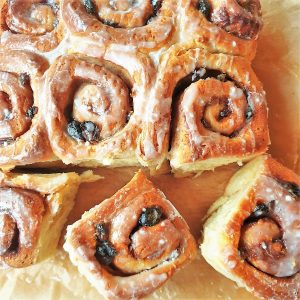 Overhead shot of glazed chelsea buns.