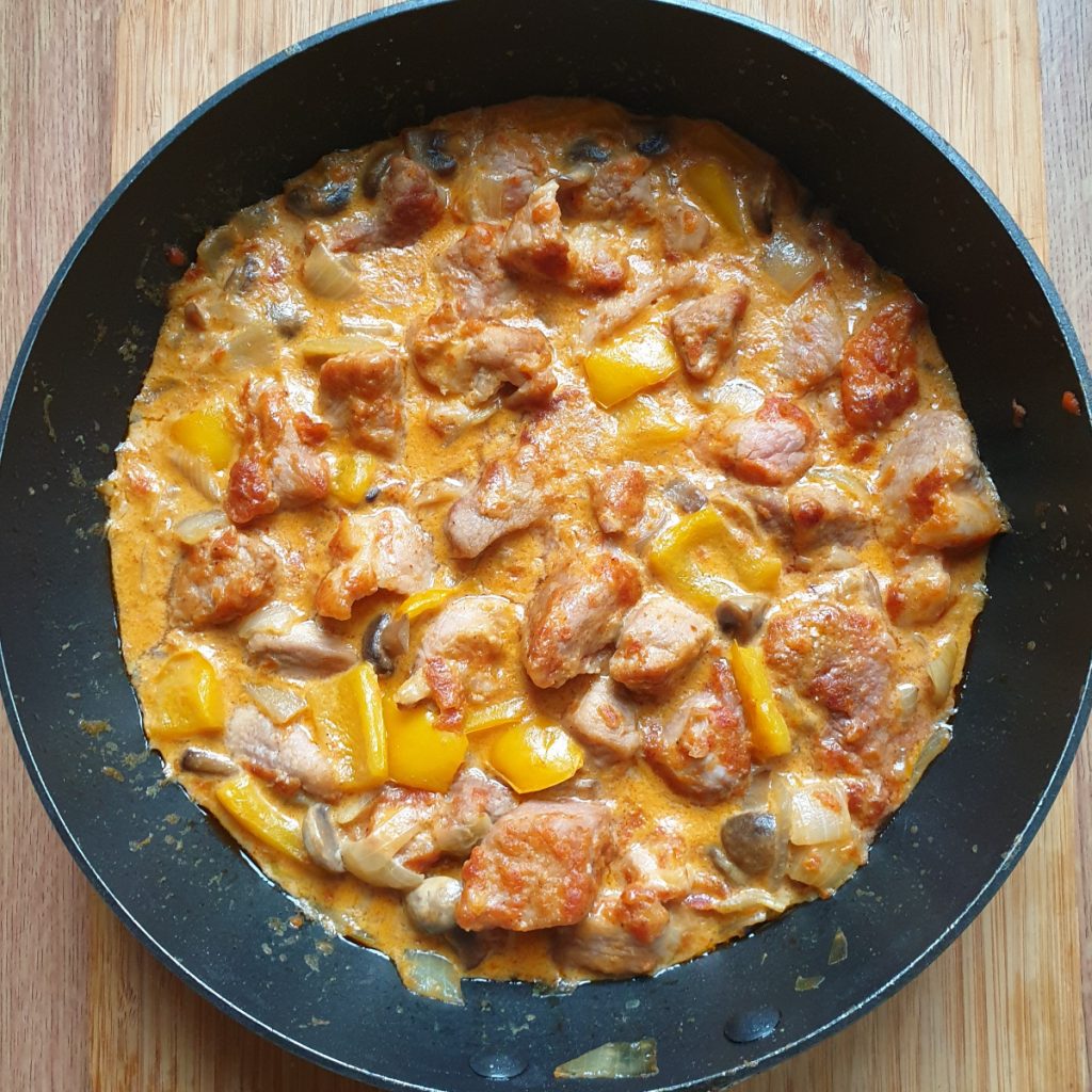 Creamy paprika pork goulash with red or yellow peppers Foodle Club