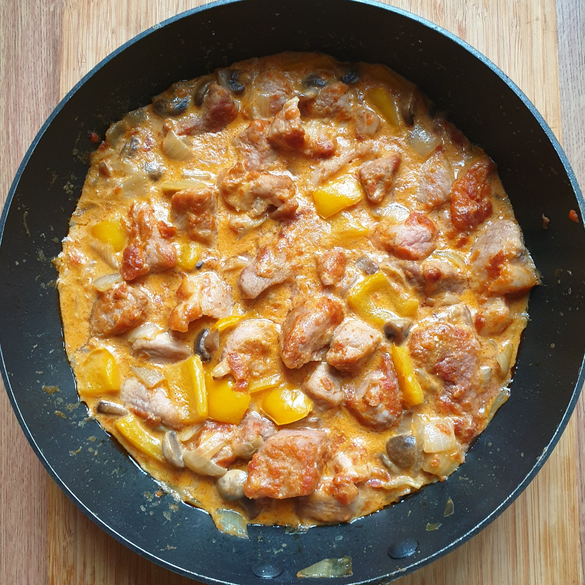 Creamy paprika pork goulash with red or yellow peppers Foodle Club