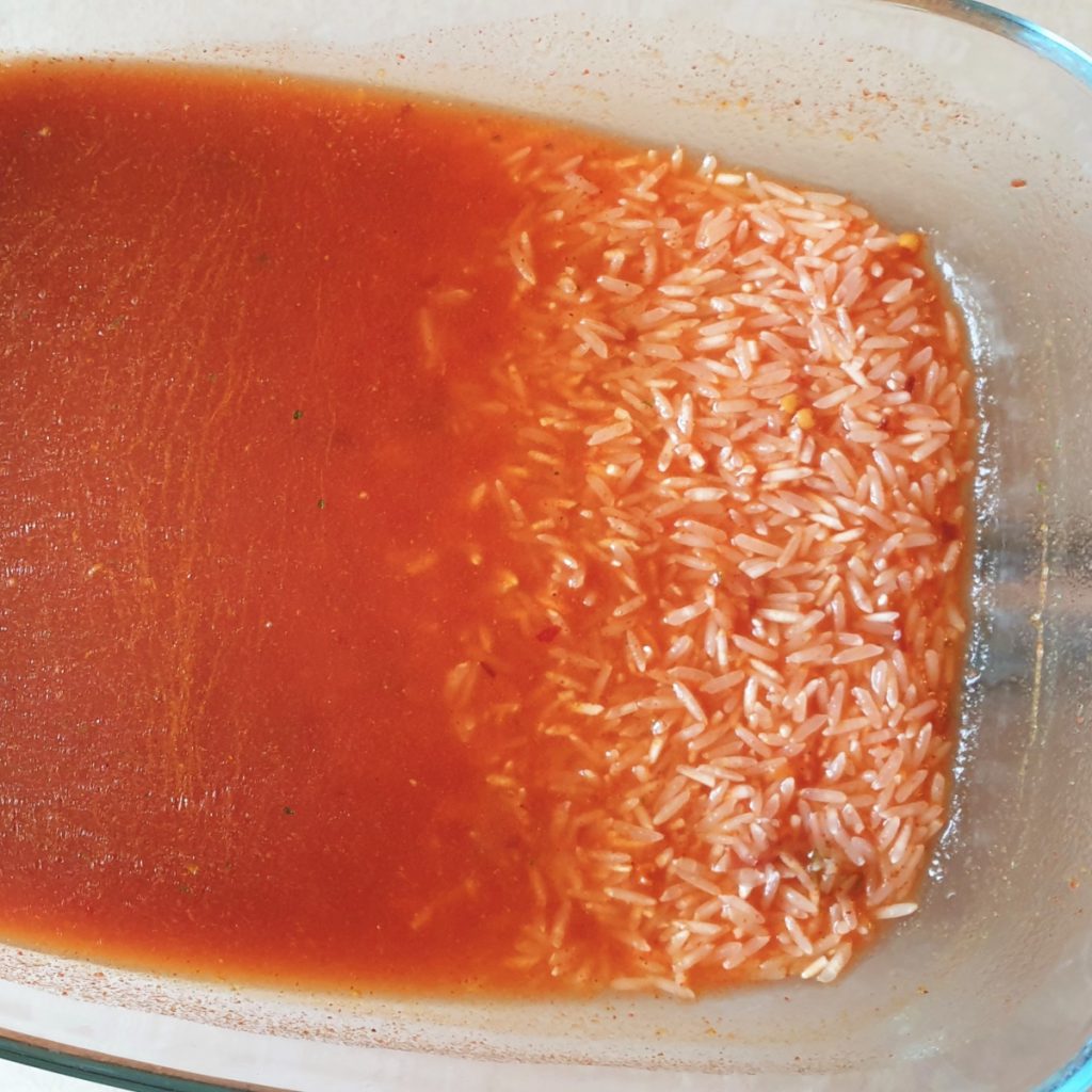 Rice in a dish of sauce.