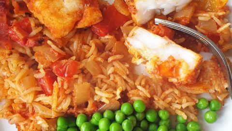 Spicy fish and rice bake in tomato sauce