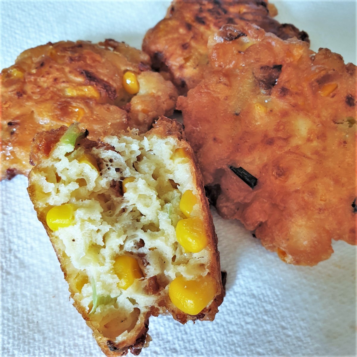 Close up shot of the inside of a sweetcorn fritter.