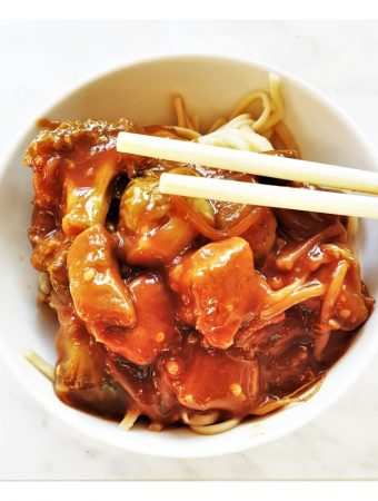 A bowl of leftover roast port in garlic sauce.