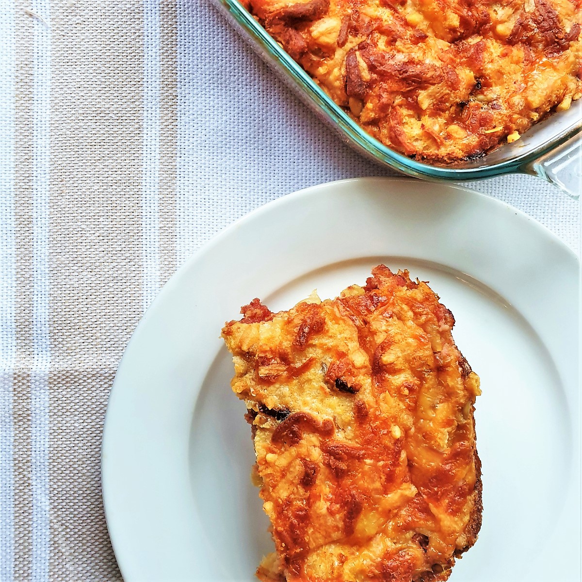 A slice of bully beef quiche on a plate.