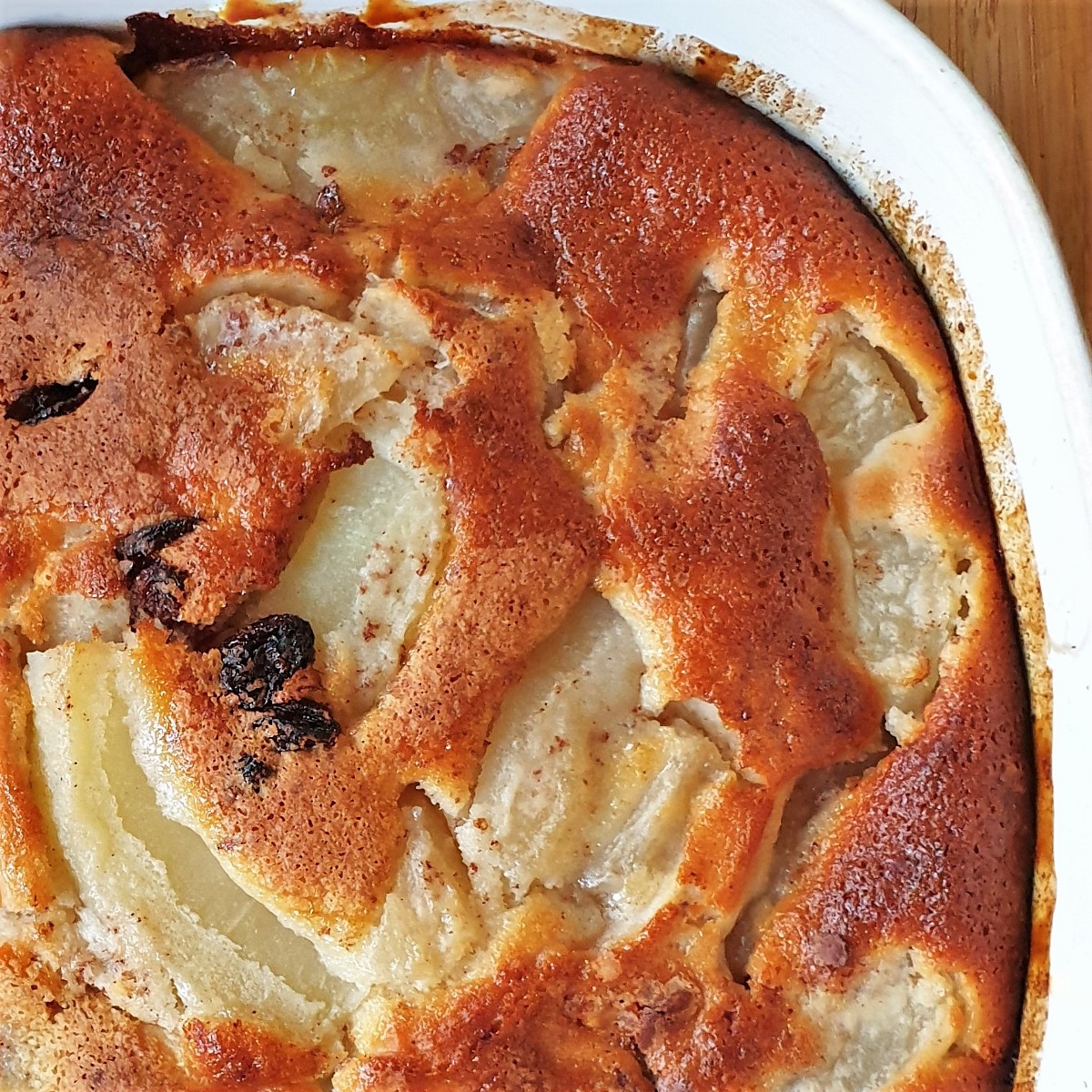 Closeup of the apple cake in a baking dish.