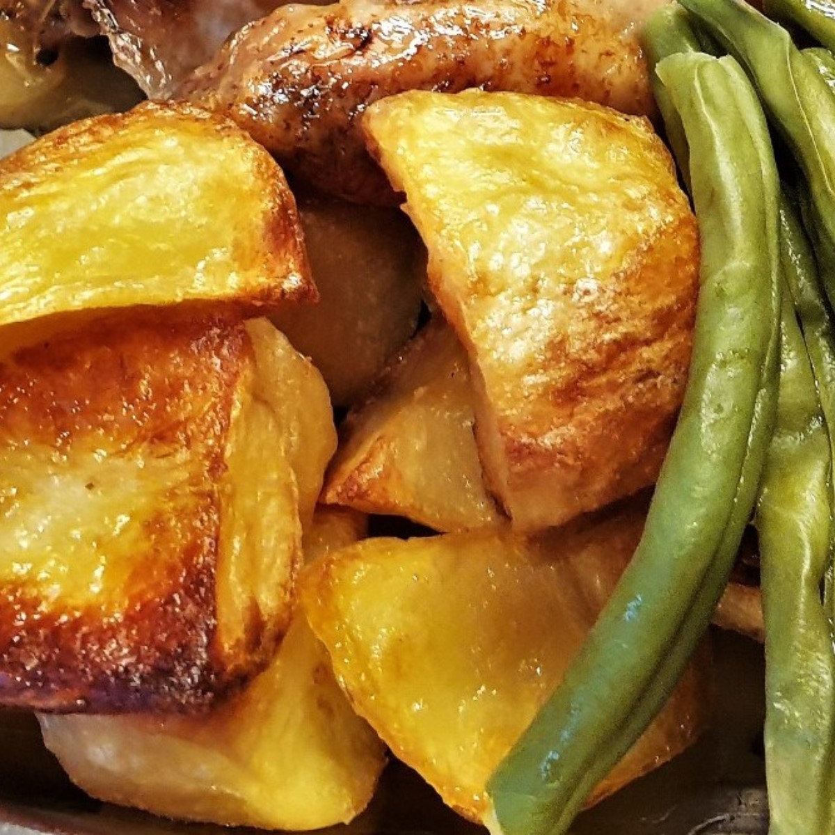 A closeup of roast potatoes.