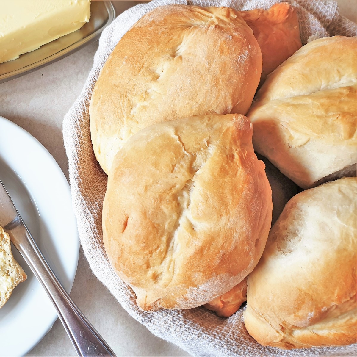 Portuguese rolls in a dish.