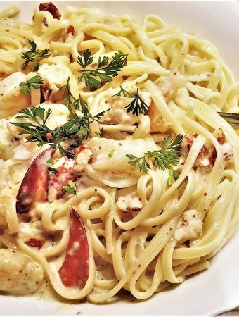 A bowl of creamy seafood linguine.