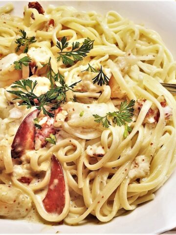 A bowl of creamy seafood linguine.