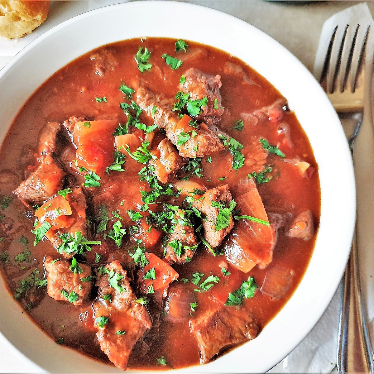 A closeup of a bowl of beef trinchado.
