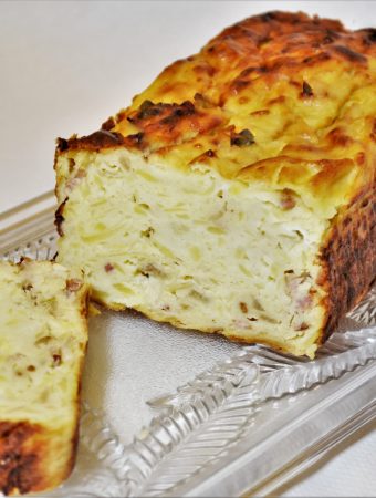 A German potthucke bake on a glass plate, showing the inside texture.