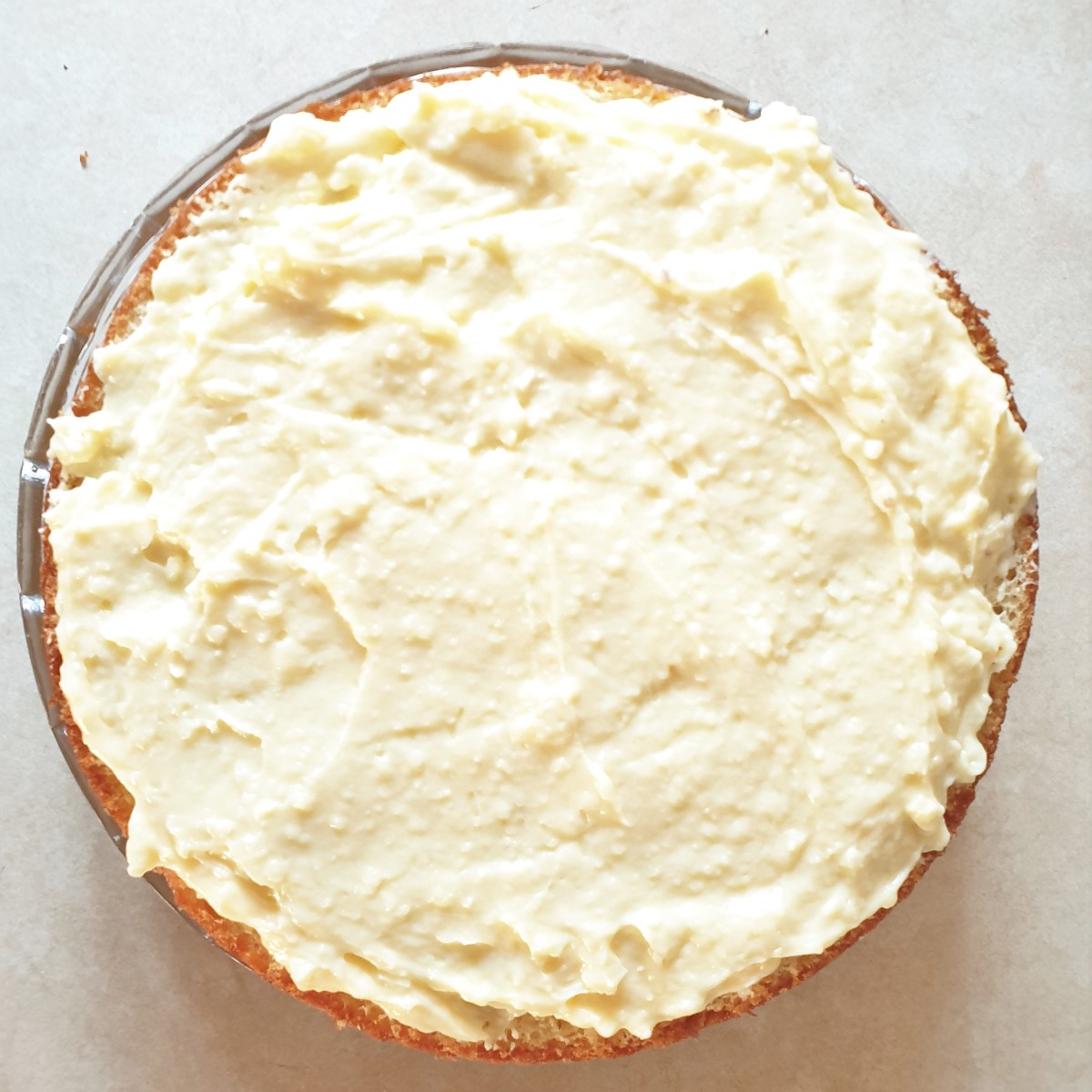 A cake cut in half and spread with creme patissiere