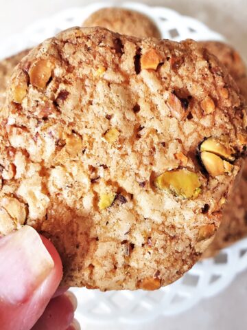 Close up of a pistachio butter biscuit.