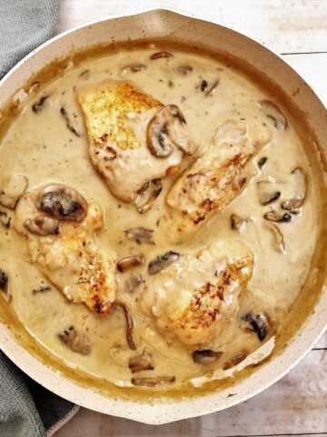 Overhead shot of chicken marsala in creamy mushroom sauce,i n a frying pan