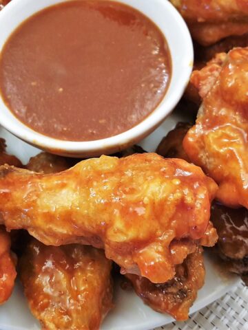 Close up of barbeque chicken wings.