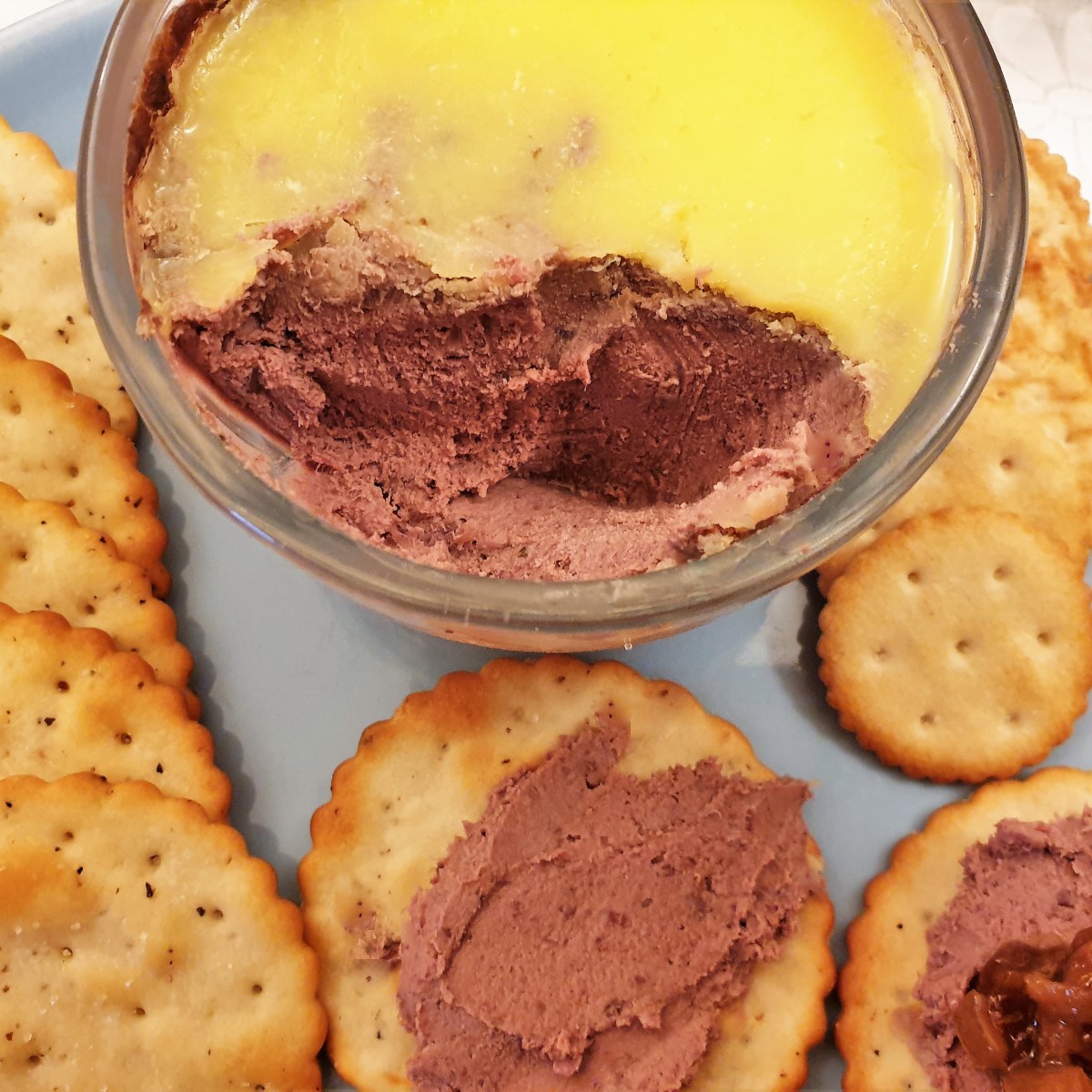 Closeup of a dish of chicken liver pate.