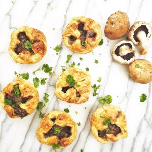 Overhead shot of 6 mushroom tarts.