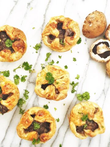 Overhead shot of 6 mushroom tarts.