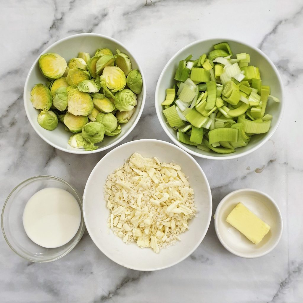 Ingredients for creamy leek and brussels sprouts bake.