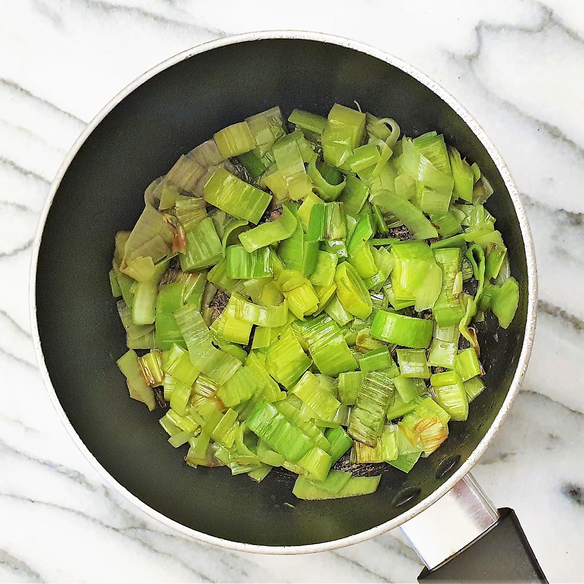 Sautee the leeks in butter.