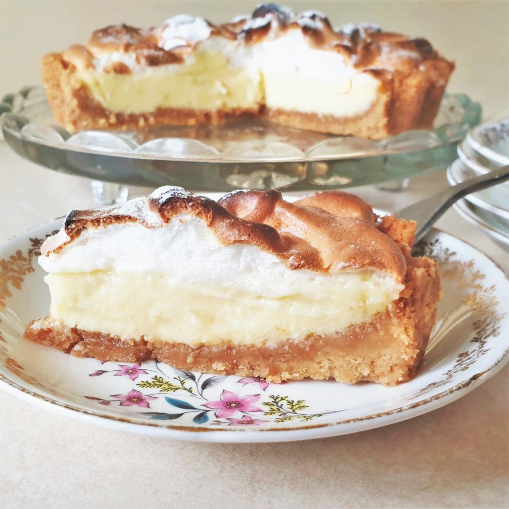A slice of key lime pie on a plate.