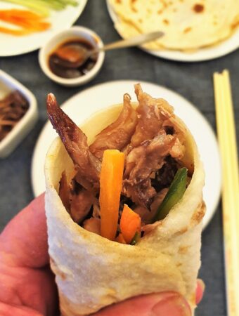 A crispy hoisin duck pancake.