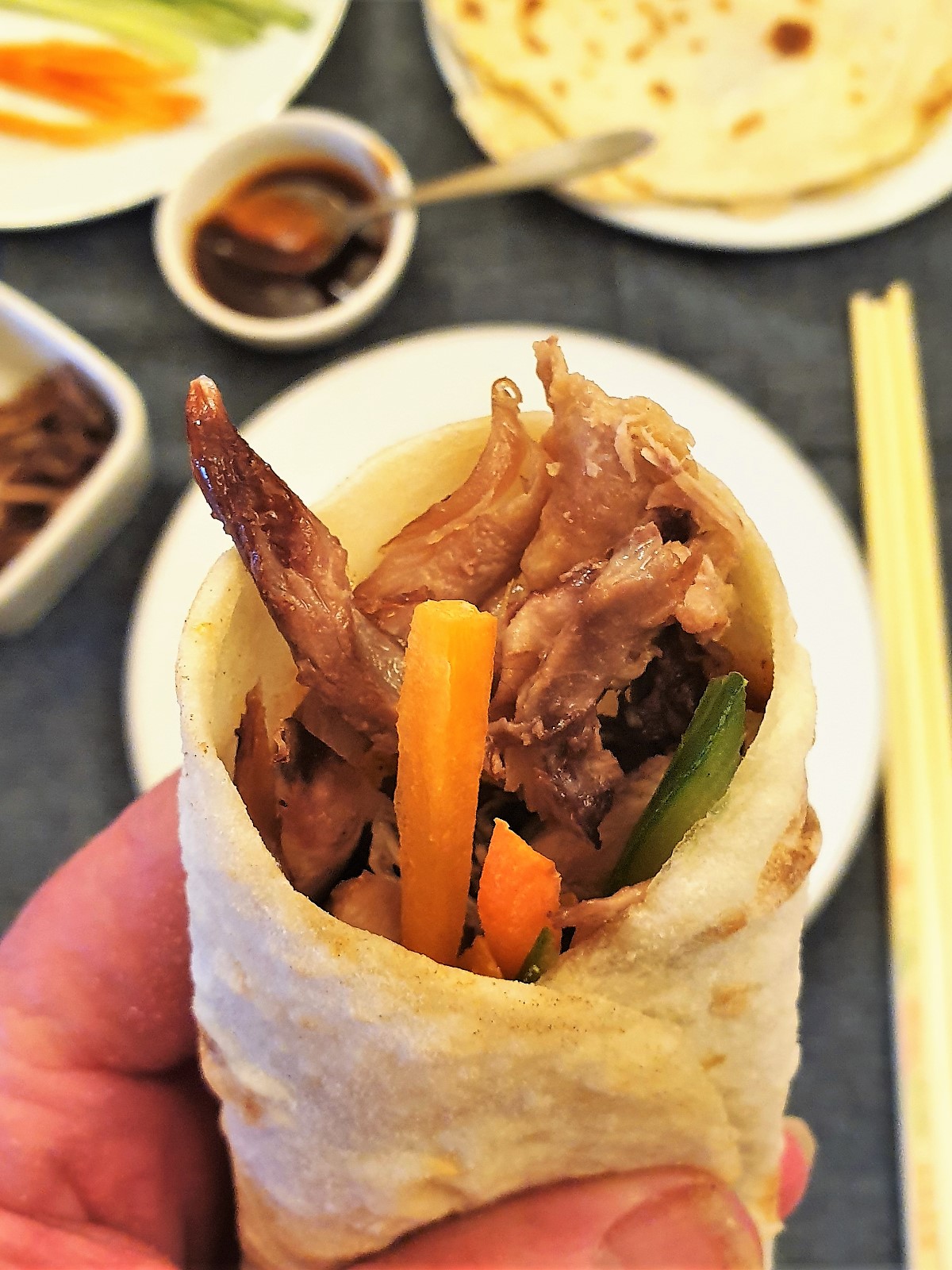 A crispy hoisin duck pancake.