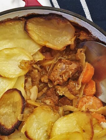 Close up of the meat and vegetables in the pork and cabbage casserole.