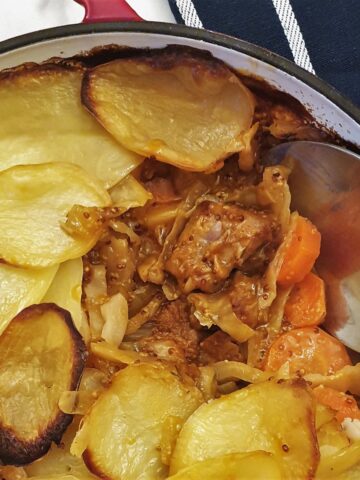 Close up of the meat and vegetables in the pork and cabbage casserole.