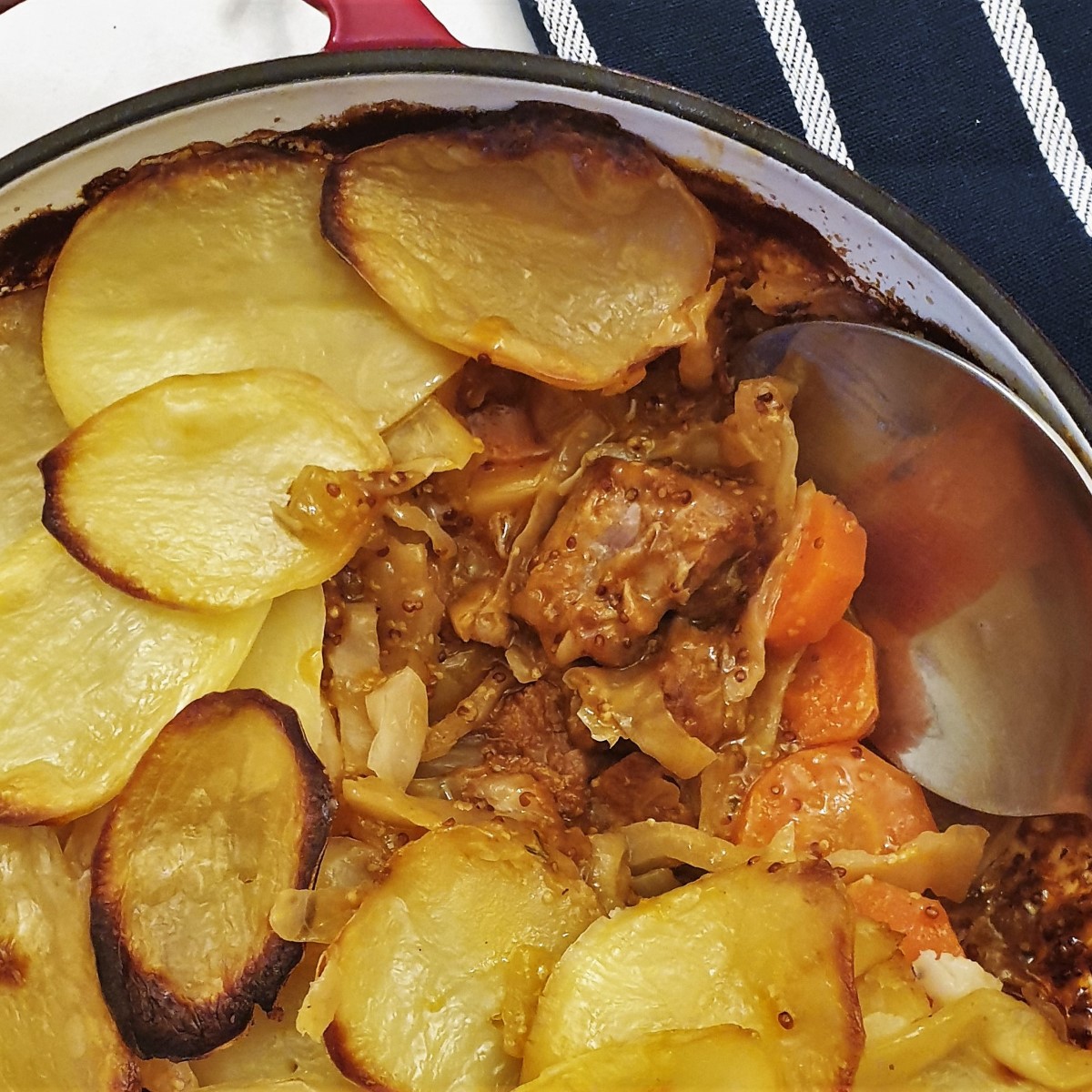 Close up of the meat and vegetables in the pork and cabbage casserole.