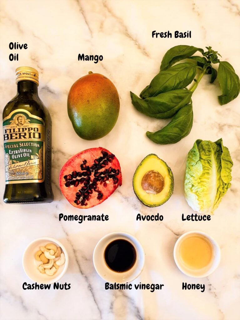 Ingredients for mango and avocado salad with cashews.