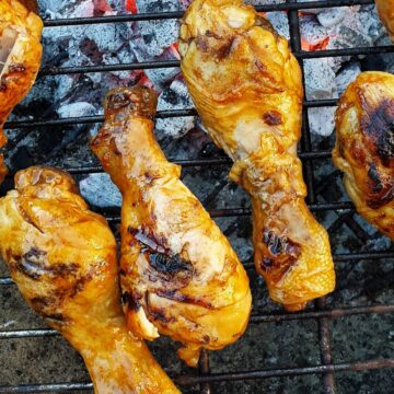 Chicken drumsticks on the barbeque grill.