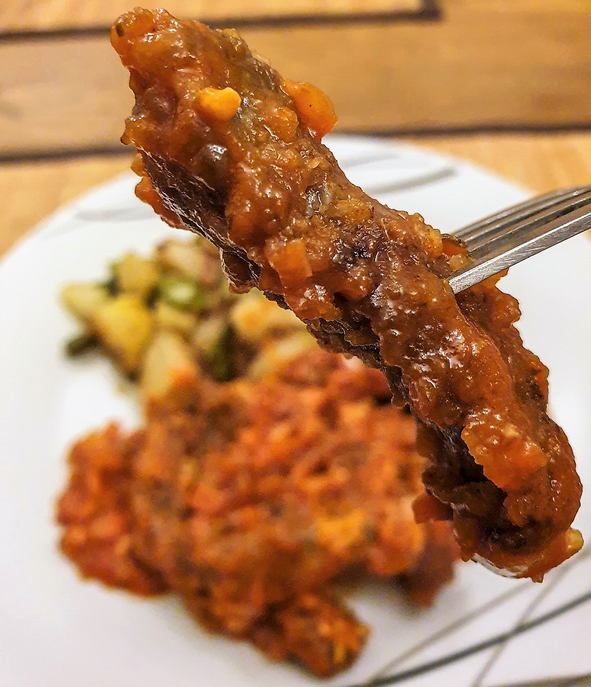 Steak strips in marinara sauce with bubble and squeak Foodle Club
