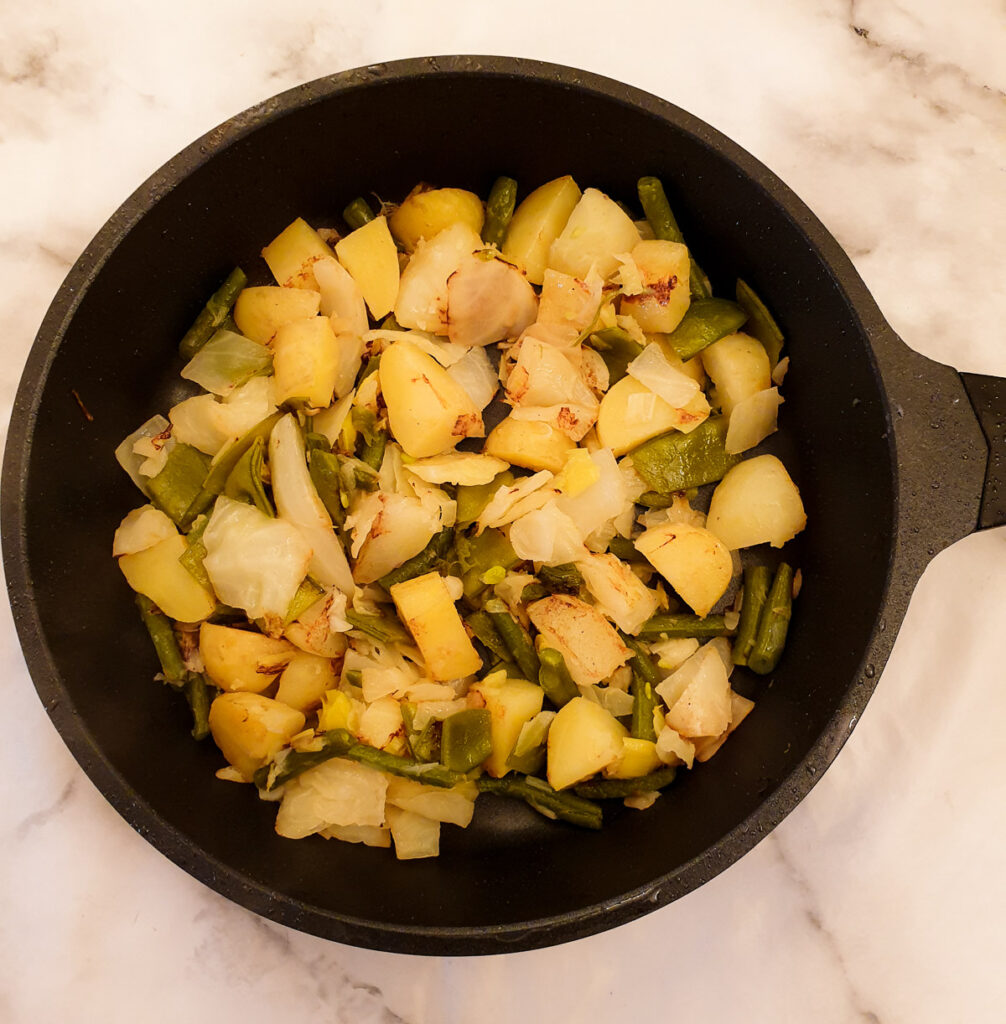 Bubble and squeak frying in a pan.