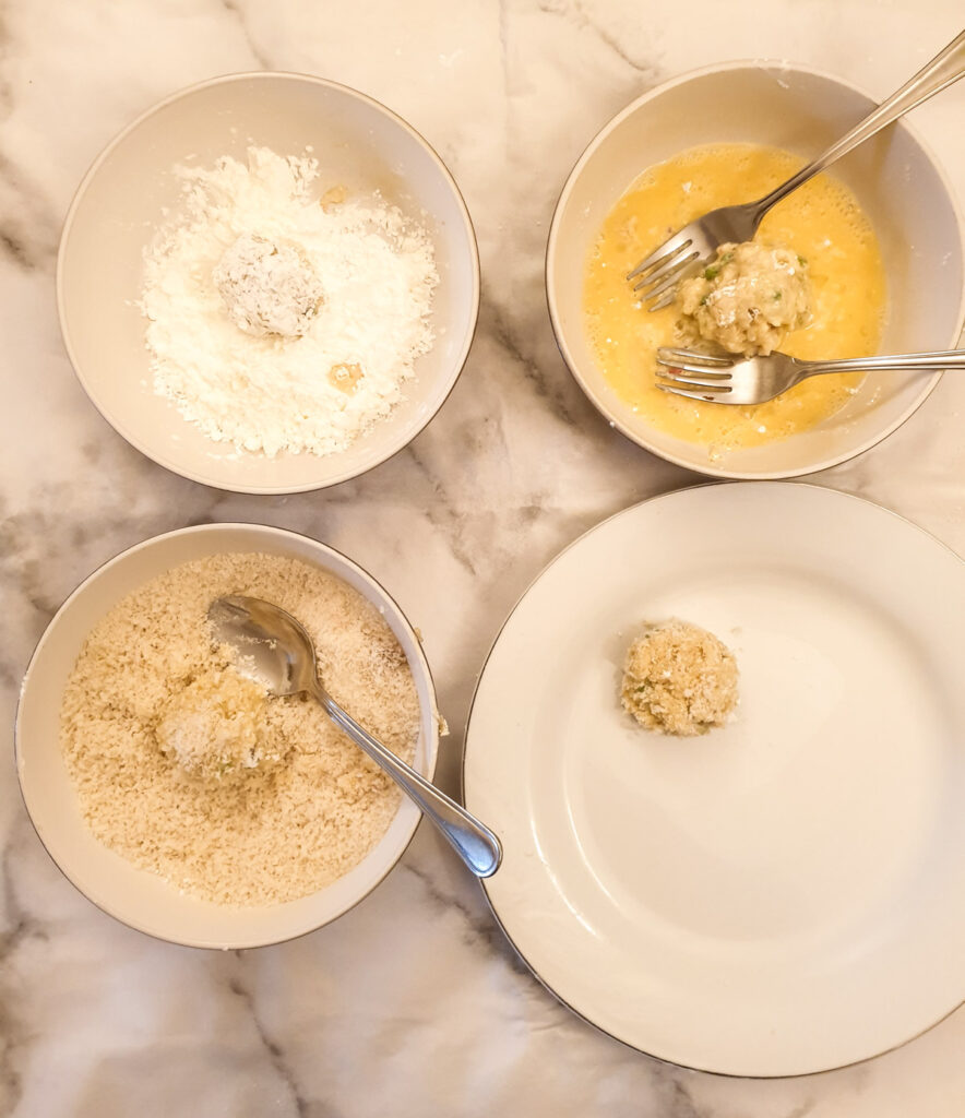 Steps for coating the arancini.