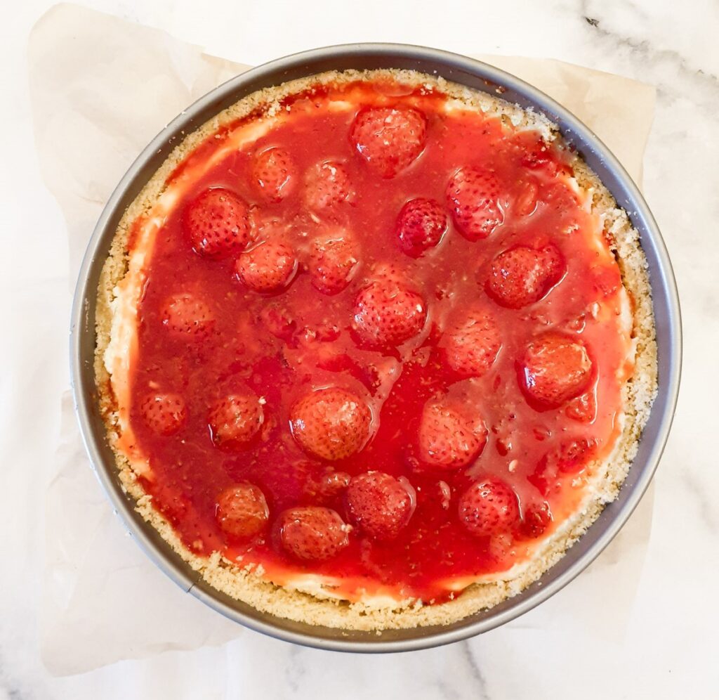 Overhead shot of the assembled strawberry cheesecake.