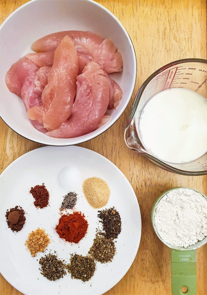 Ingredients for fried chicken tenderloins.