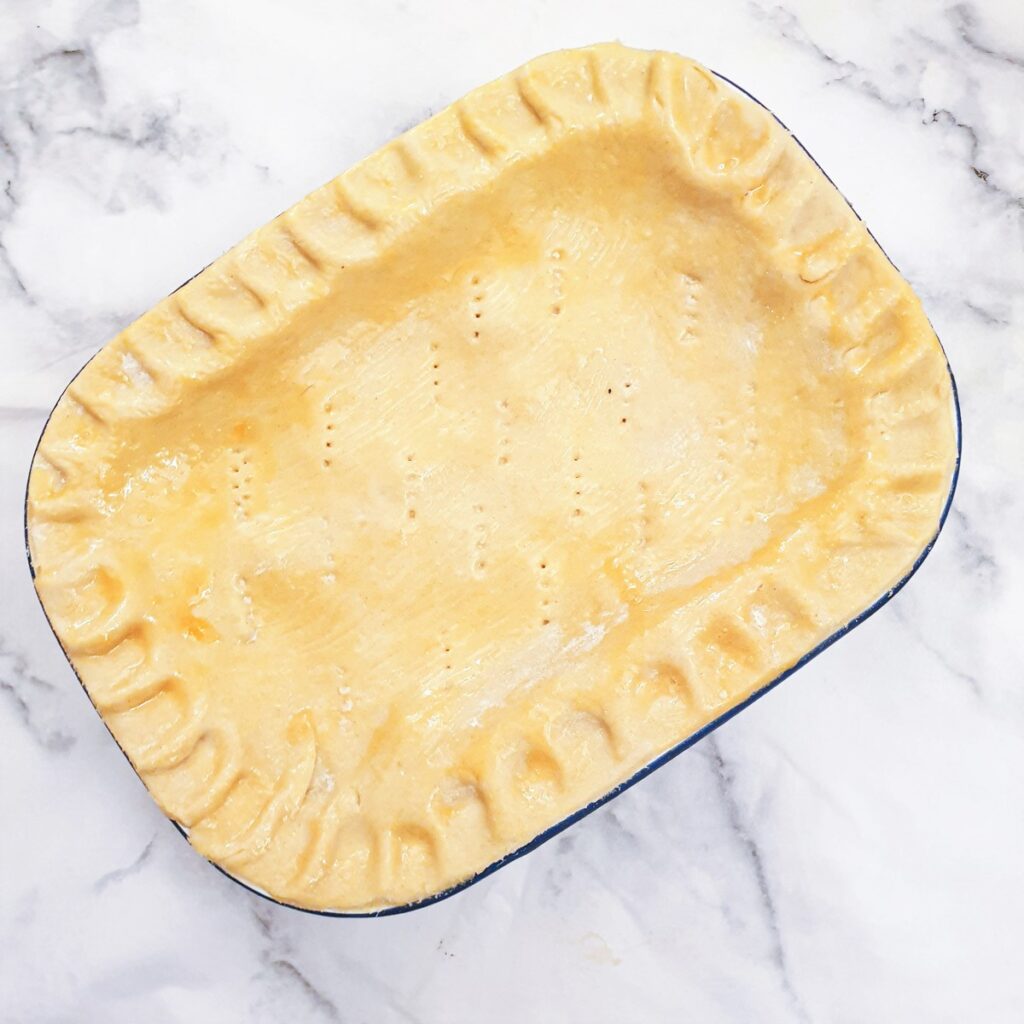 Granny's homemade chicken pie ready for the oven.