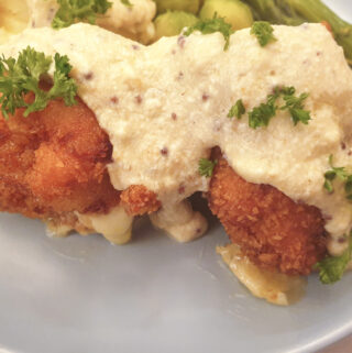 Crispy chicken cordon bleu covered with honey mustard sauce.